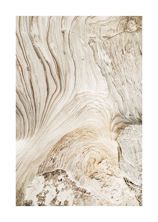  – Valokuva beigestä kalliosta, jossa on kiemurteleva, abstrakti kuvio