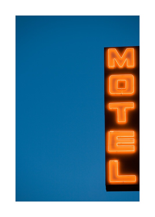  - Valokuva neonvalokyltistä tekstillä ”Motel” tummansinisellä taustalla