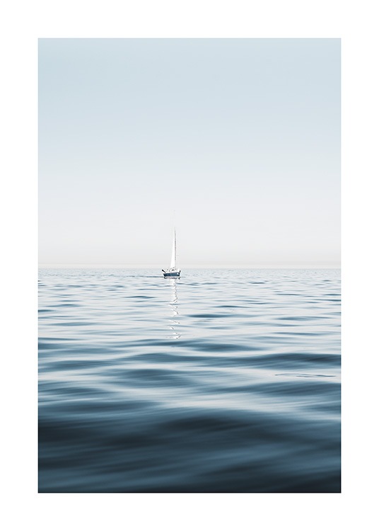  – Valokuva purjeveneestä ja kirkkaan meren rauhallisista aalloista